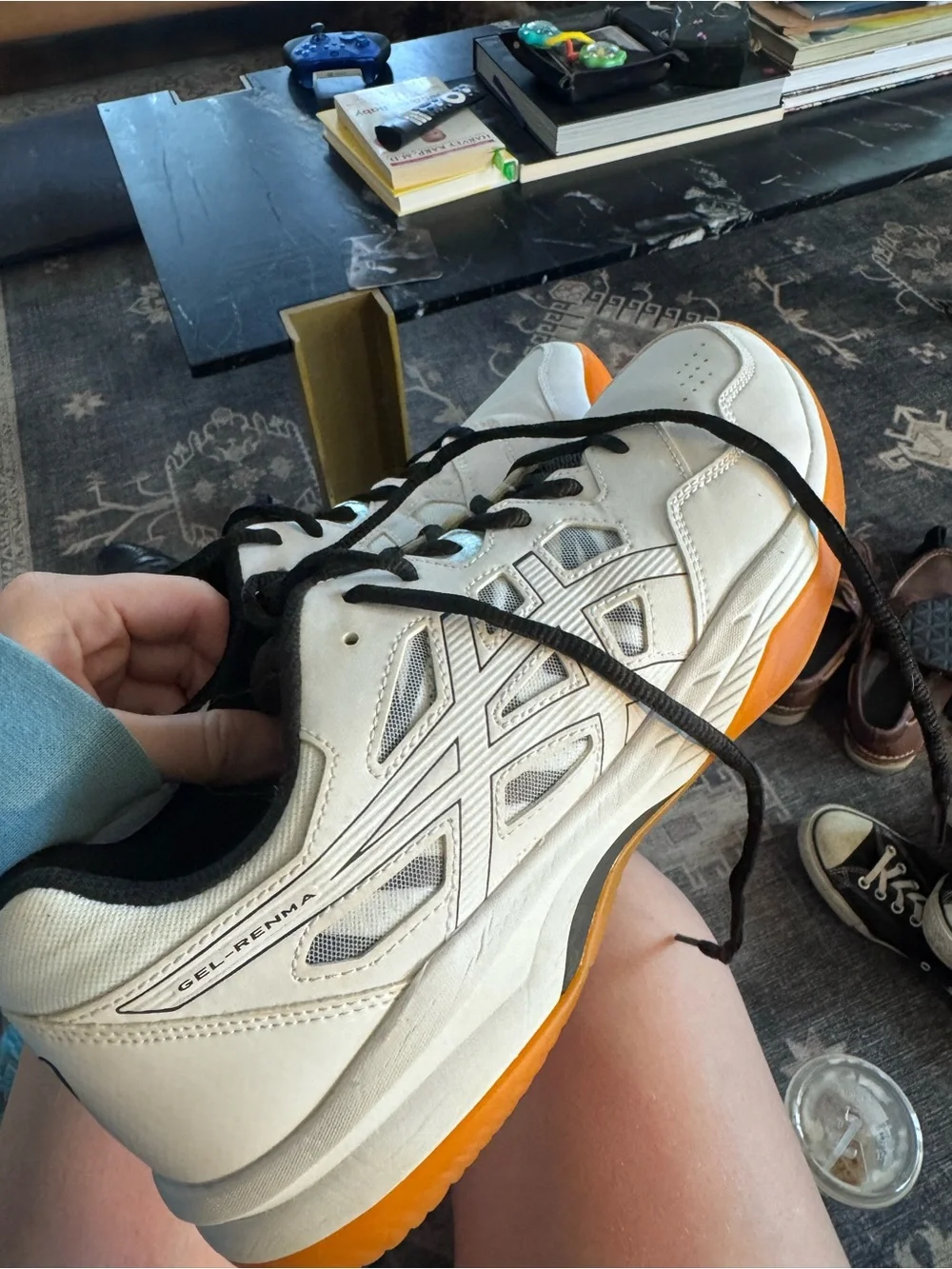 Asics White Athletic Shoe with Orange Outsole and Black Accents